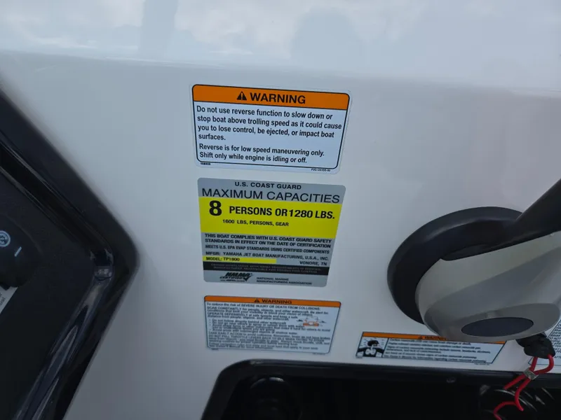 Slide: The Image of 2021 Yamaha SX195 boat capacity and warning labels, maximum 8 persons or 1280 lbs. - 15
