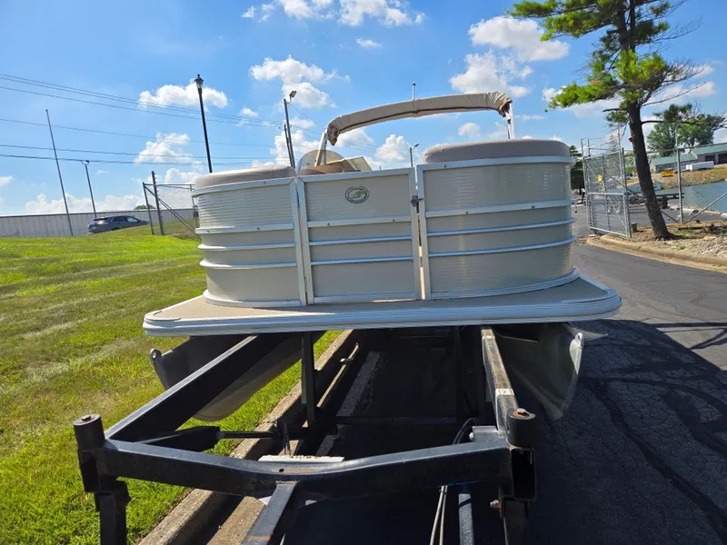 Slide: The Image of 2013 Starcraft Stardeck 190 Cruise pontoon boat on trailer, sunny day, grassy background. - 6