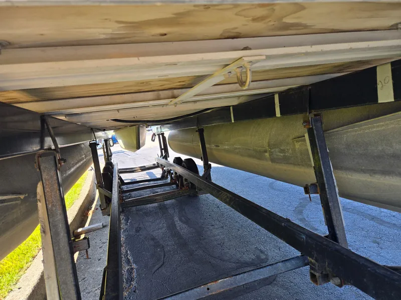 Slide: The Image of Underneath view of a 2013 Starcraft Stardeck 190 Cruise on a trailer. - 7