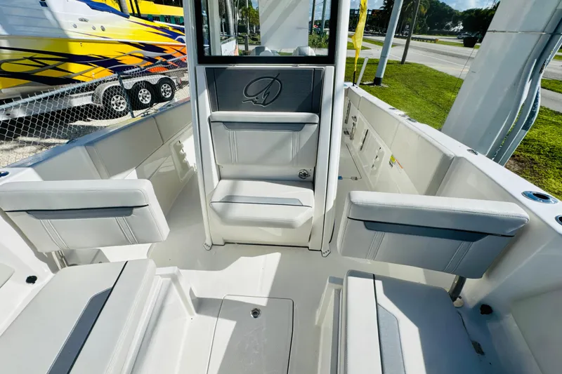 Slide: The Image of Interior view of 2026 Sailfish 252 CC boat with seating and storage compartments. - 12