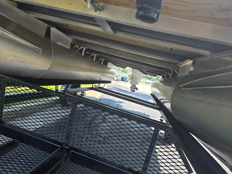 Slide: The Image of Underneath view of a 2019 Bennington 188 SFV pontoon boat on a trailer. - 7