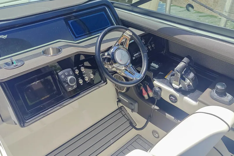 Slide: The Image of Luxurious interior of 2018 Sea Ray SLX 310 boat with sleek seating and modern design. - 14