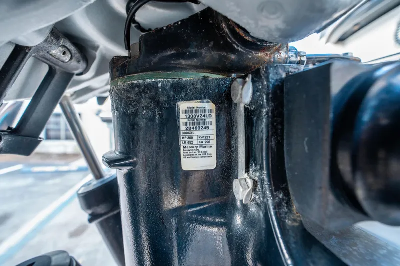 Slide: The Image of Close-up of a 2018 Sea Ray SLX 310 engine part with model label. - 32