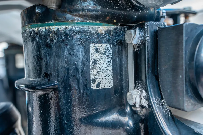 Slide: The Image of Close-up of a weathered engine part on a 2018 Sea Ray SLX 310 boat. - 33