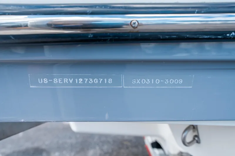 Slide: The Image of 2018 Sea Ray SLX 310 boat hull identification number close-up. - 34
