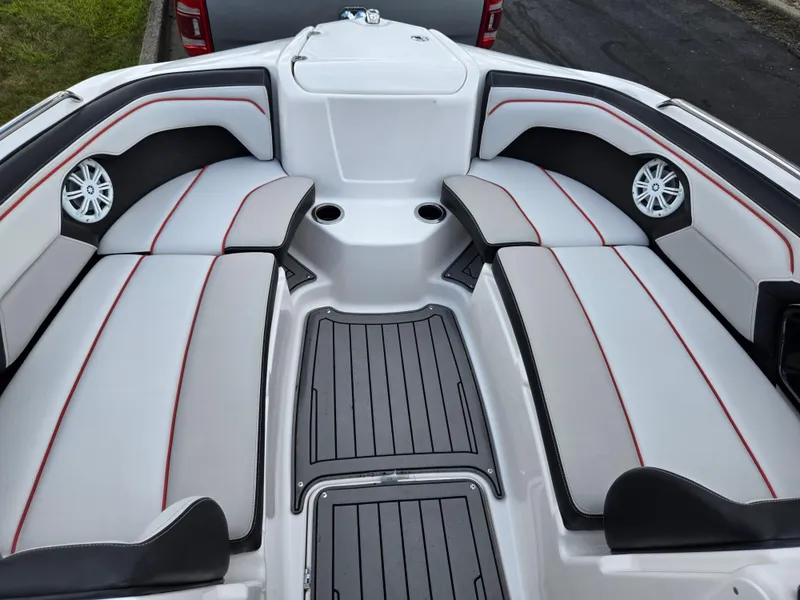 Slide: The Image of 2018 Yamaha Boats 212X interior with sleek seating and modern design. - 17