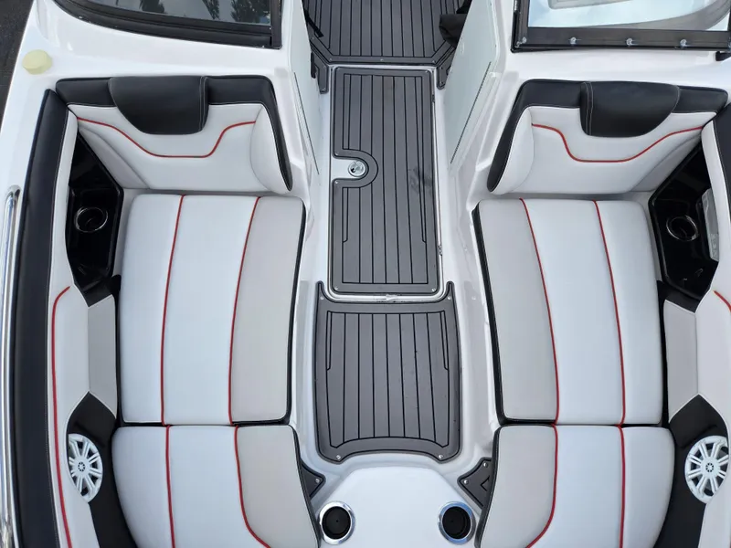 Slide: The Image of 2018 Yamaha Boats 212X interior with sleek seating and modern design. - 20