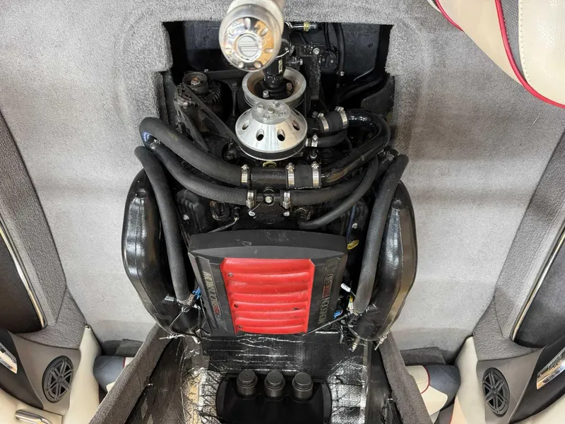 Slide: The Image of Engine compartment of a 2013 Malibu Response TXi Open Bow boat. - 10