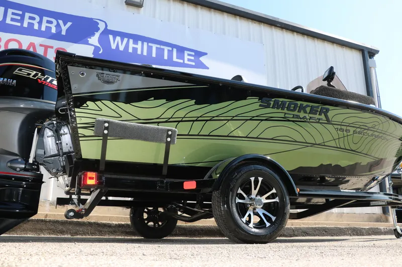 Slide: The Image of 2025 Smoker Craft Excursion 166 SC boat on trailer, side view. - 2