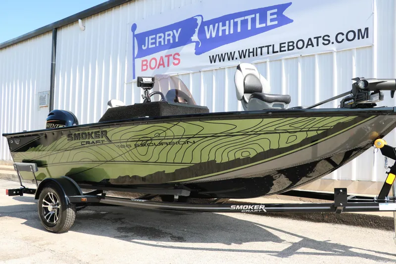 Slide: The Image of 2025 Smoker Craft Excursion 166 SC boat displayed at Jerry Whittle Boats dealership. - 4