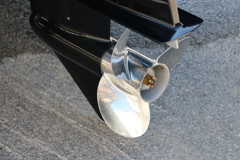 Slide: The Image of Propeller of 2025 Smoker Craft Excursion 166 SC boat on pavement. - 9