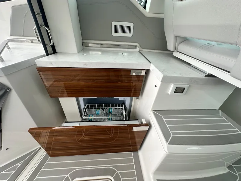 Slide: The Image of 2023 Tiara Yachts 43 LE interior with sleek cabinetry and modern design. - 15