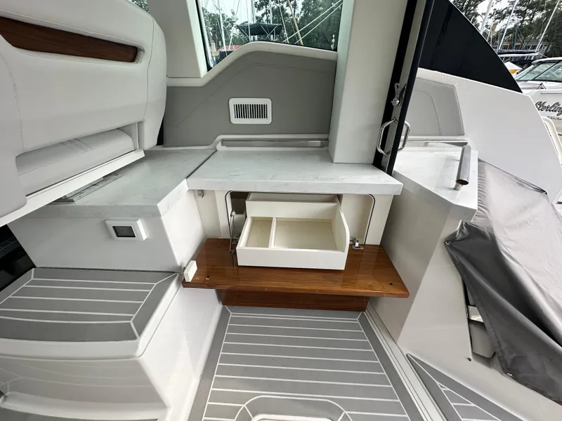 Slide: The Image of 2023 Tiara Yachts 43 LE interior with sleek cabinetry and modern design elements. - 32