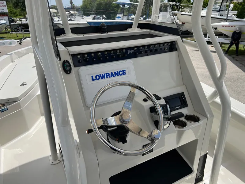 Slide: The Image of 2015 Ranger 2510 Bay boat console with Lowrance electronics and steering wheel. - 11