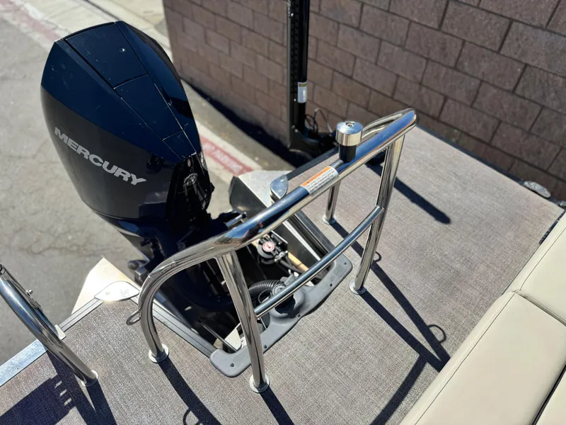 Slide: The Image of 2023 Barletta Cabrio 24UC boat with Mercury engine and stainless steel railing. - 20