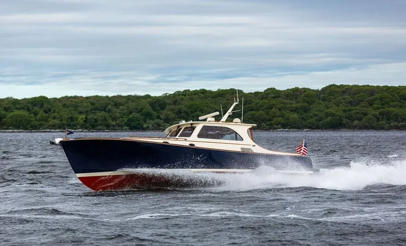 Slide: The Image of 2007 Hinckley Talaria 44 MY cruising on a scenic waterway. - 37