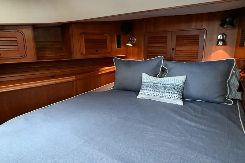 Slide: The Image of Luxurious cabin interior of 2007 Hinckley Talaria 44 MY with elegant wood finish. - 42