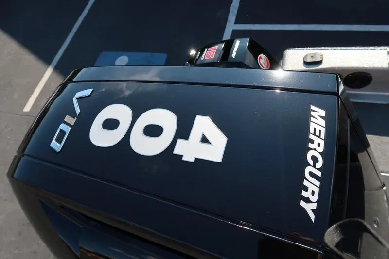 Slide: The Image of 2024 Warrior 238 DC with Mercury V10 engine, showcasing model details. - 8