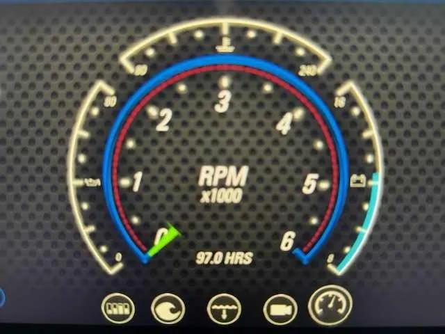 Slide: The Image of Tachometer display of 2022 Malibu 21 LX showing 97 hours and RPM gauge. - 7