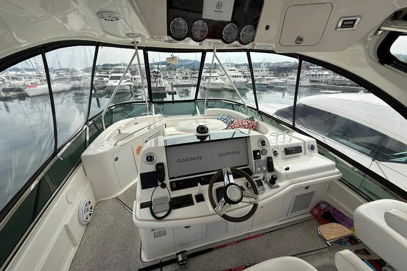 Slide: The Image of Interior view of 2010 Sea Ray 520 Sedan Bridge yacht with Garmin navigation system. - 11