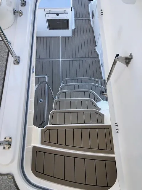 Slide: The Image of Staircase on 2010 Sea Ray 520 Sedan Bridge yacht with sleek, modern design and non-slip flooring. - 14