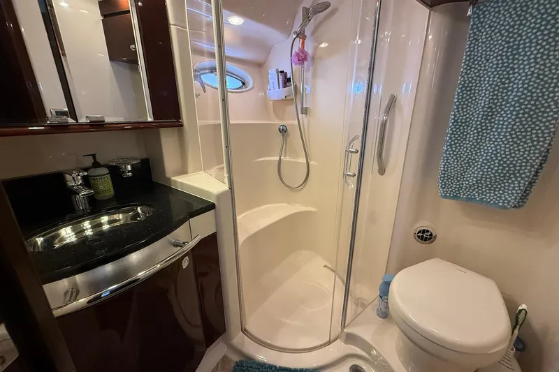 Slide: The Image of Luxurious bathroom in 2010 Sea Ray 520 Sedan Bridge yacht with shower and modern amenities. - 22
