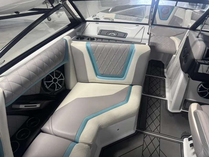 Slide: The Image of 2019 Tigé ZX1 boat interior with stylish seating and modern design elements. - 10