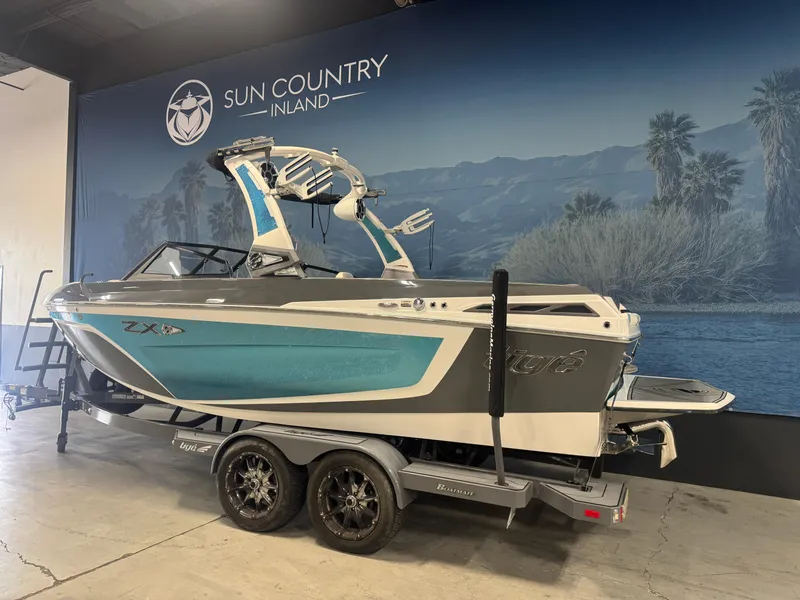 Slide: The Image of 2019 Tigé ZX1 boat on trailer at Sun Country Inland showroom. - 3