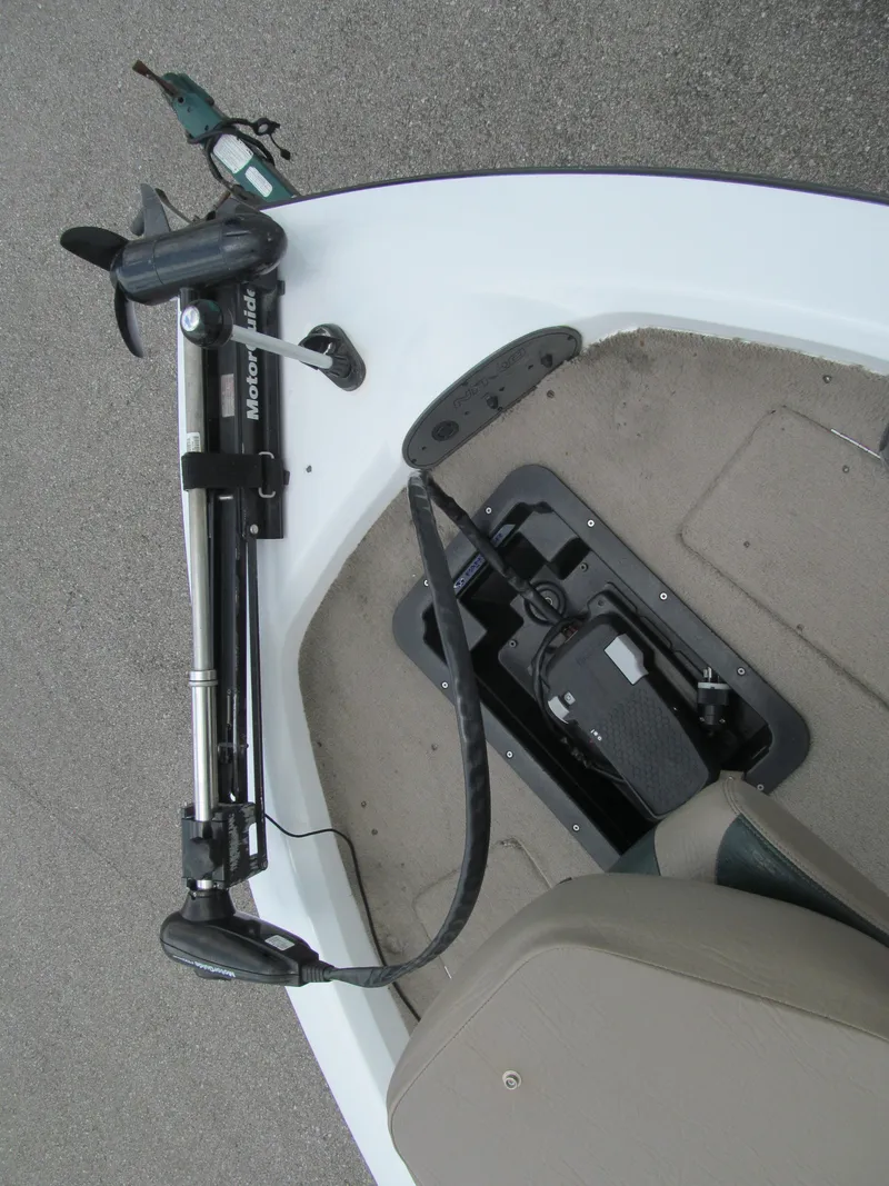 Slide: The Image of 2006 Nitro 640 LX boat with trolling motor and foot pedal control. - 7