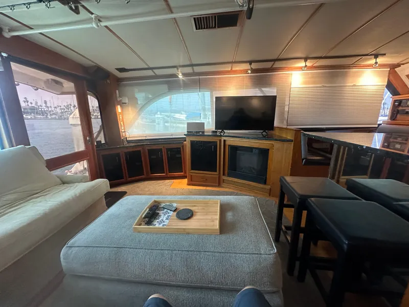 Slide: The Image of Luxurious interior of 1986 Egg Harbor SPORT FISHER yacht with cozy seating and modern amenities. - 6