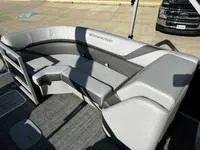 Slide: The Image of 2025 Bennington 25 SXSR boat interior with gray seating and modern design. - 14