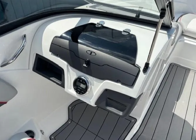 Slide: The Image of Interior view of a 2021 Tahoe 700 boat dashboard with sleek design and modern controls. - 18