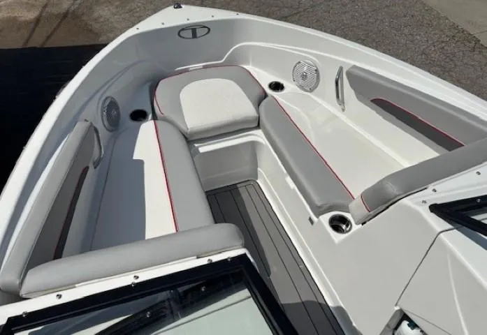 Slide: The Image of 2021 Tahoe 700 boat interior with gray seating and red accents. - 8