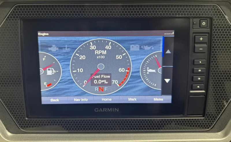 Slide: The Image of Garmin display showing engine RPM and fuel flow on 2020 Manitou 23 Oasis RF. - 20