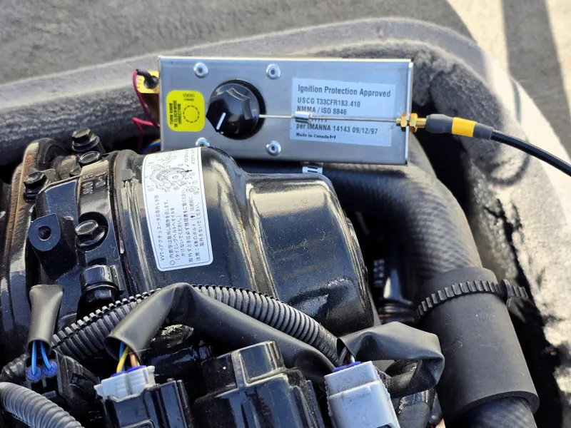 Slide: The Image of Engine component of 2000 Toyota Epic 22 with ignition protection label. - 19