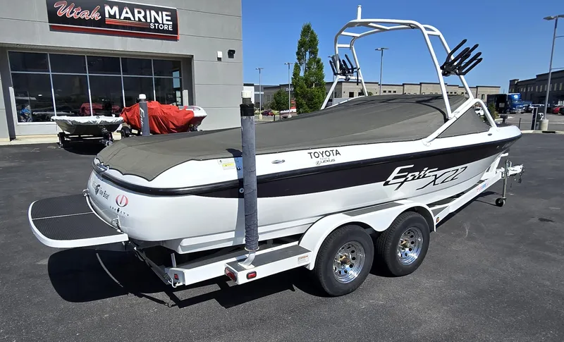 Slide: The Image of Toyota Epic 22 boat, 2000 model, parked outside Utah Marine Store. - 3