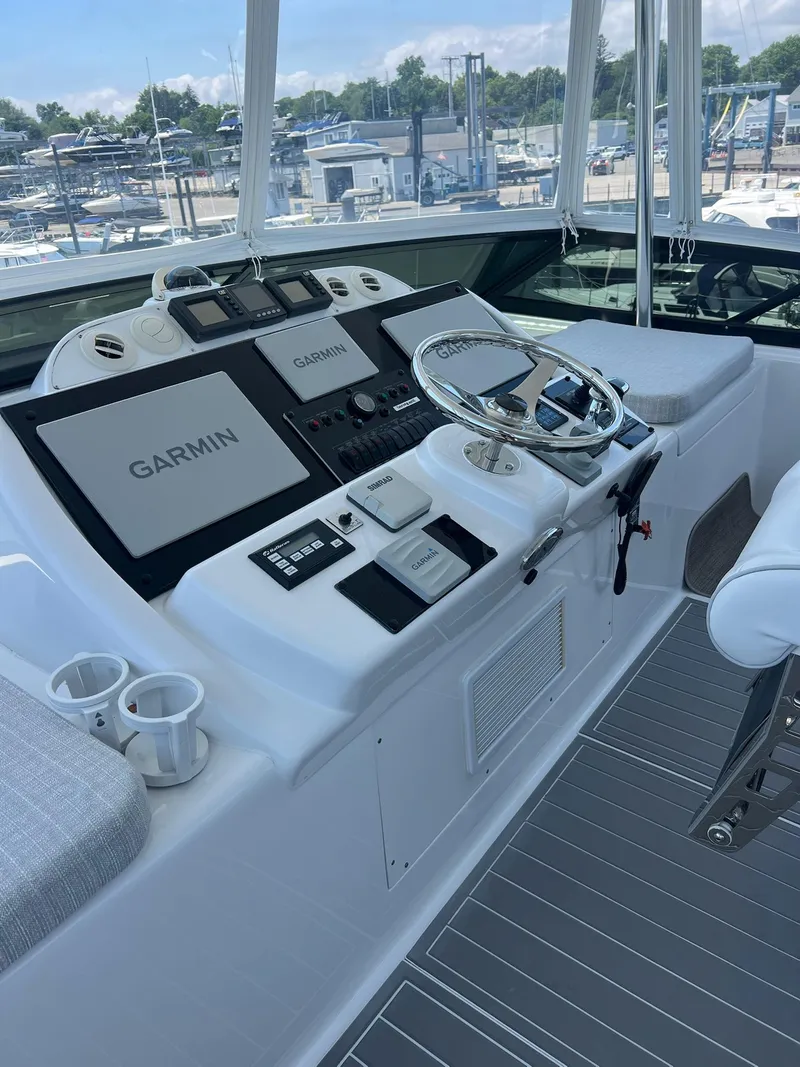 Slide: The Image of Helm of 2011 Hatteras 60 Motor Yacht with Garmin navigation systems. - 17