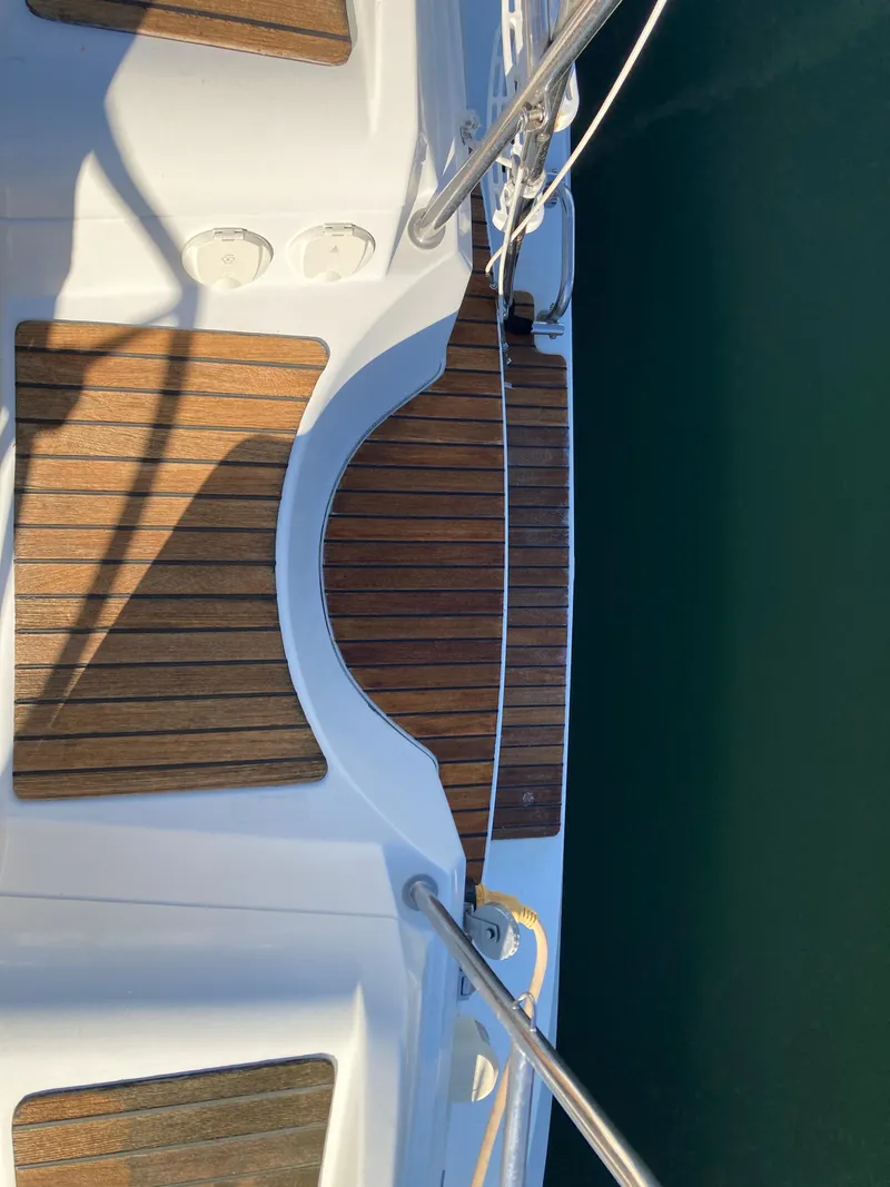 Slide: The Image of Deck of 2008 Jeanneau Sun Odyssey 42 DS sailboat with teak flooring. - 6