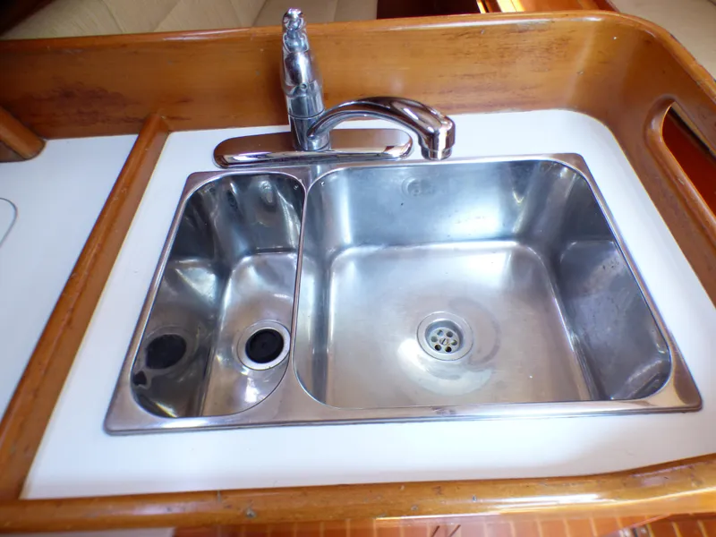 Slide: The Image of Stainless steel sink in 2002 J Boats J/109 yacht galley. - 19