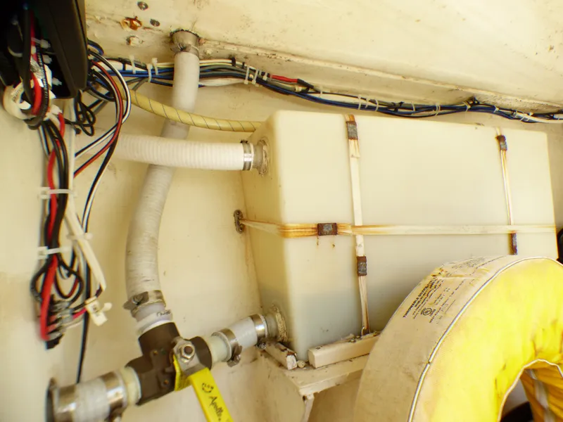Slide: The Image of Interior of 2002 J Boats J/109 showing wiring, water tank, and life preserver. - 32