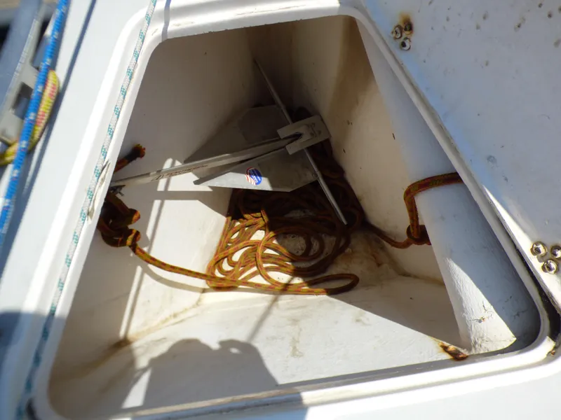 Slide: The Image of Anchor locker of a 2002 J Boats J/109 with ropes and anchor inside. - 41