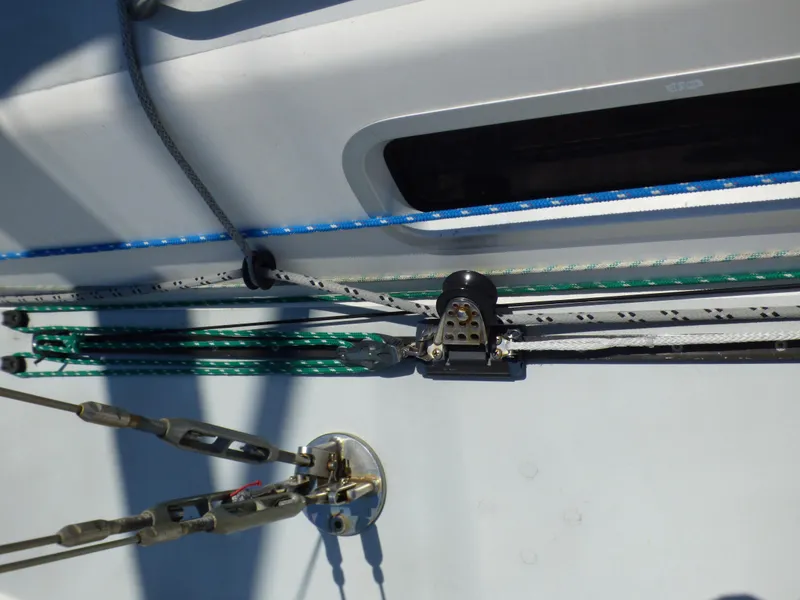 Slide: The Image of Close-up of J/109 sailboat rigging and deck hardware, showcasing ropes and fittings. - 45