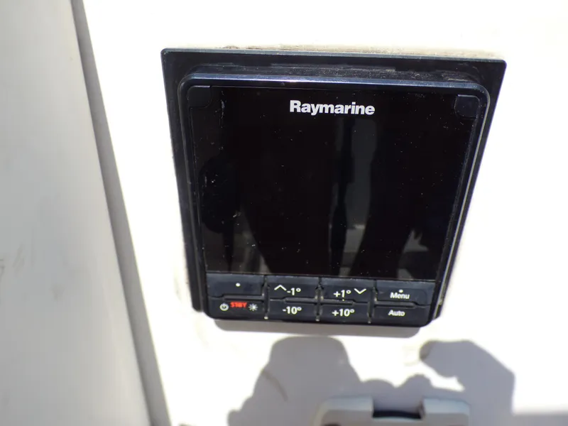 Slide: The Image of Raymarine control panel on a 2002 J Boats J/109 sailboat. - 47