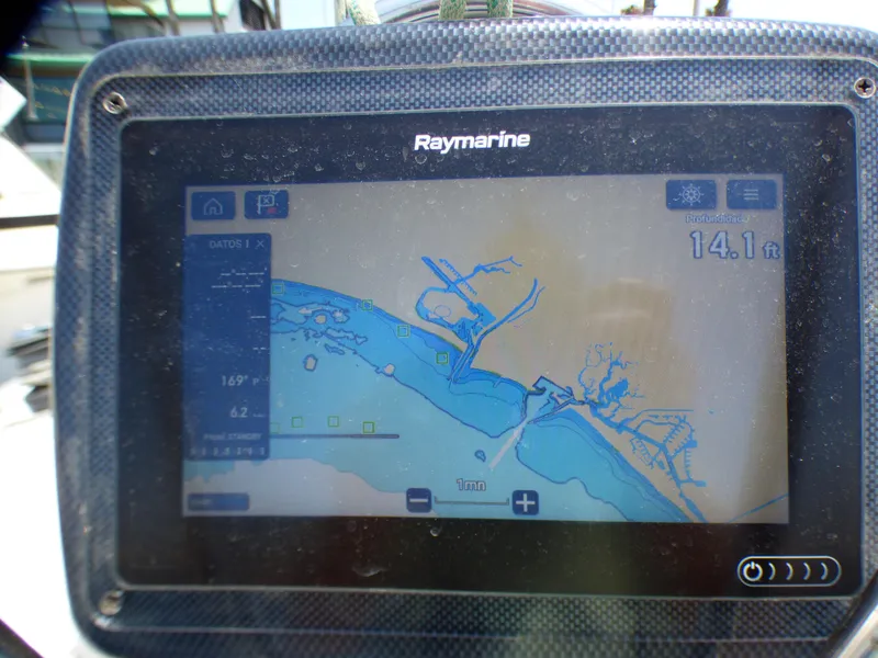 Slide: The Image of Raymarine navigation display on a 2002 J Boats J/109 sailboat showing a coastal map. - 49