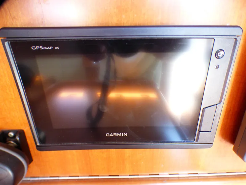 Slide: The Image of Garmin GPSMAP XS on 2002 J Boats J/109 yacht, mounted on wooden panel. - 8
