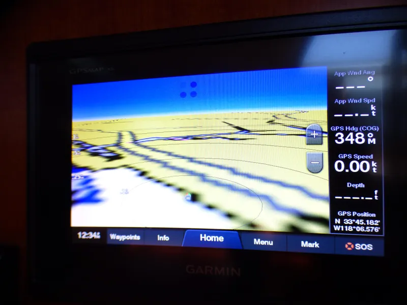 Slide: The Image of Garmin GPS display on 2002 J Boats J/109, showing navigation data and coordinates. - 9