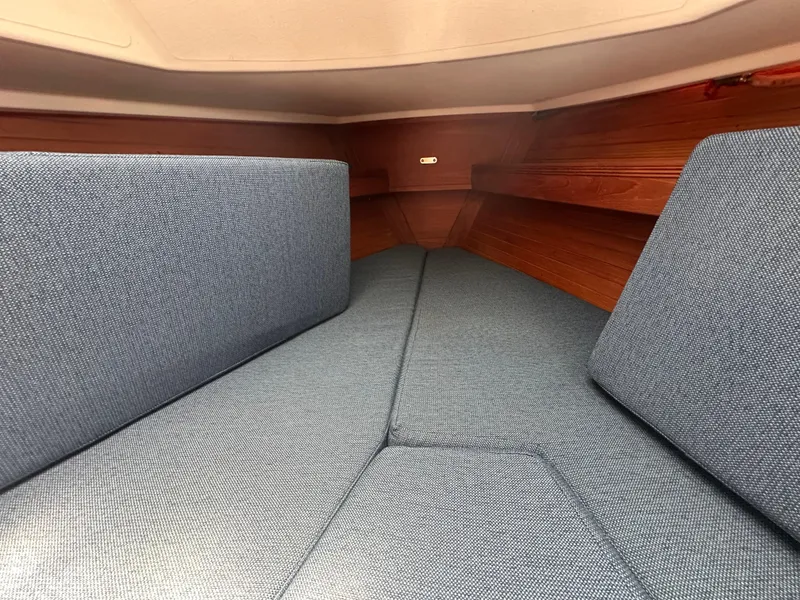 Slide: The Image of Interior cabin of a 1986 Sabre 32 sailboat with blue upholstery. - 11