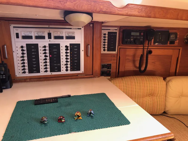 Slide: The Image of Control panel and seating area inside a 1989 Nonsuch 33 sailboat cabin. - 7