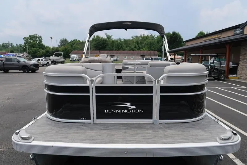 Slide: The Image of 2020 Bennington 20 SLV pontoon boat in parking lot, rear view. - 5
