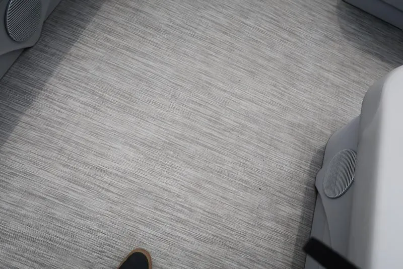 Slide: The Image of Interior flooring of a 2020 Bennington 20 SLV boat, featuring gray textured surface. - 7